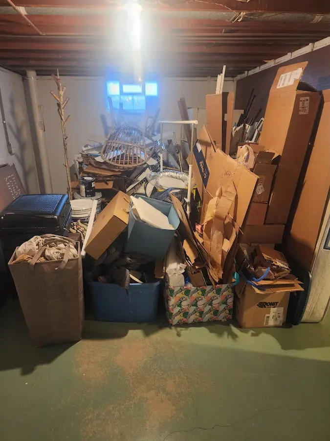 Roll-off dumpster container at job site for 2 Yard Dumpster Rental in Wildwood